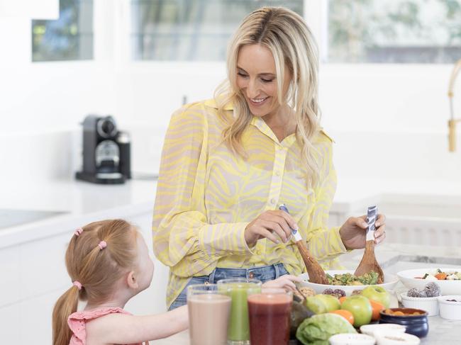 , NETWORK SPECIAL. MUST TALK WITH NETWORK PIC DESK BEFORE PUBLISHING. Nutritionist Amelia Phillips, 46, with daughter Ella. She runs the website ameliaphillips.com.au where people can go for access to recipes and easy home cooking courses.