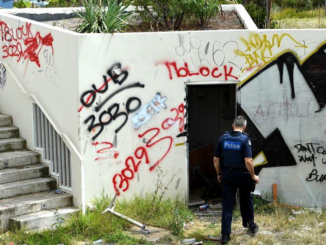 Police inspect the trashed Ecoville Community centre, Tarniet. Picture: Nicole Garmston