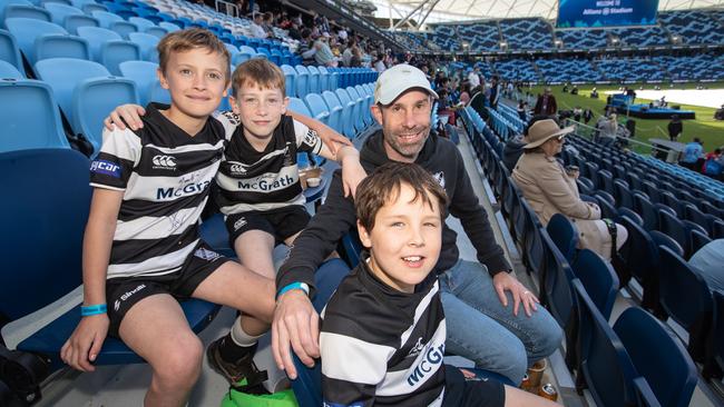 The Richardson family: Dad Adam, with kids (left to right) Rocco, Lloyd and Toby.