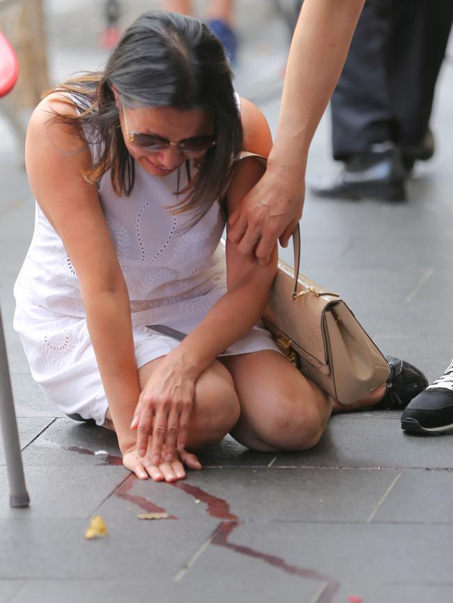 Vivian Vo breaks down at the scene. Picture: John Grainger