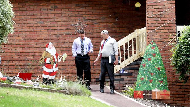 Police leaving the house today. Picture: Andrew Tauber