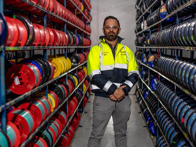 AAP Manly Daily Rick Masotto photographed in the Fibre store at Prysmian cable factory, Cromer on Monday, 25 May 2020. Prysmian cable factory is providing cable for NBN rollout across the country. (AAP Image / Monique Harmer)