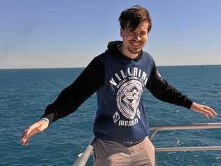 DREAM BOAT: Bundy local Adam Thompson is all smiles on-board the luxurious catamaran. Picture: Rhylea Millar