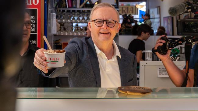 Prime Minister Anthony Albanese pictured serving ice cream at Bar Italia, Norton Street, Leichhardt after having coffee with supporters. Picture: PMO via NewsWire
