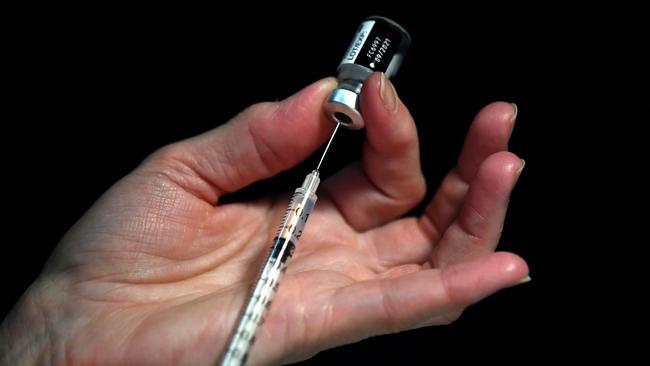 A nurse prepares a syringe of the Pfizer-BioNtech Covid-19 vaccine. Picture: AFP