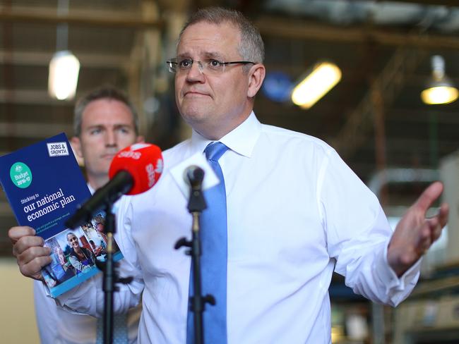 Treasurer Scott Morrison gestures while being interviewed during a visit to the VBP Interiors factory in Padstow, in Sydney, Thursday, May 18, 2016. Morrison has talked up the growing participation of women in the workforce as new figures show the jobless rate steady at 5.7 per cent.(AAP Image/David Moir) NO ARCHIVING