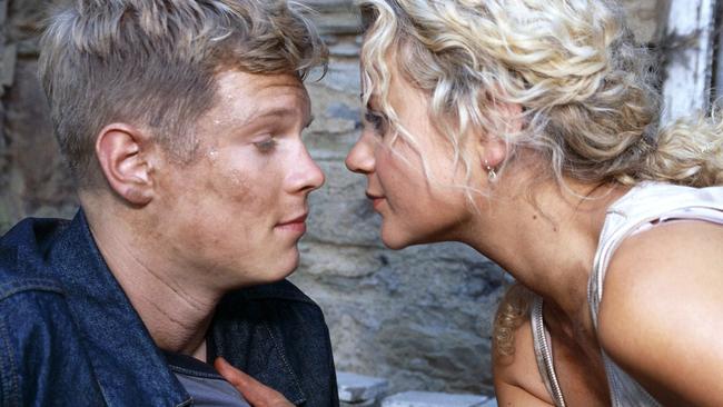 Actor Luke Ford with Rachael Carpani in scene from TV program McLeod's Daughters.