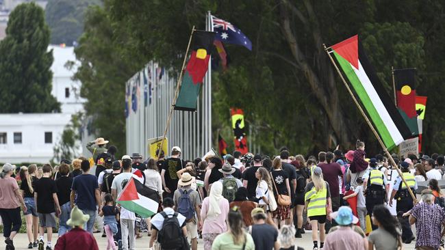 The group chanted slogans for both causes. Picture: NCA NewsWire / Martin Ollman