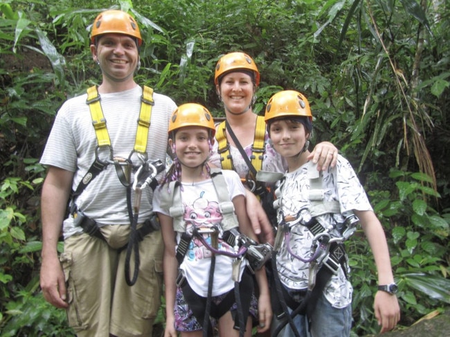 “This was taken just before we were attached to a steel cable and hurled through the Thai jungle (like a flying fox – the tour was called “Flight of the Gibbons.”) As you can see, my husband looks like he was quite excited about the tour.” Picture supplied by Peta to Awkward Family Photos.