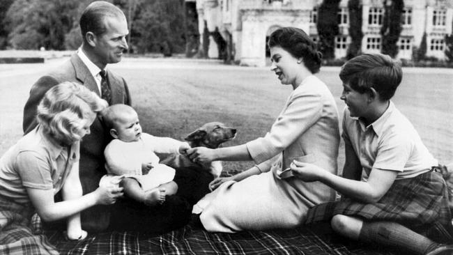 In September 1960, Prince Philip and the Queen pose at Balmoral with their children Anne and Charles and a six-month-old Prince Andrew. Under a declaration by the Privy Council this year, it was agreed the couple’s descendants could use the surname Mountbatten-Windsor. Picture: AFP