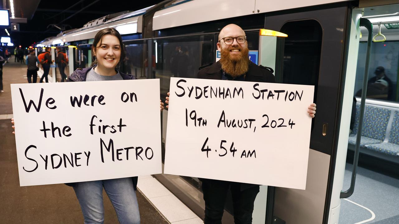 Pictured at Sydenham Station is Brigitte Myers and Mark Fleming who were among the first passengers on the brand new Sydney Metro on its maiden run to Tallawong at 4.54am. Picture: Richard Dobson