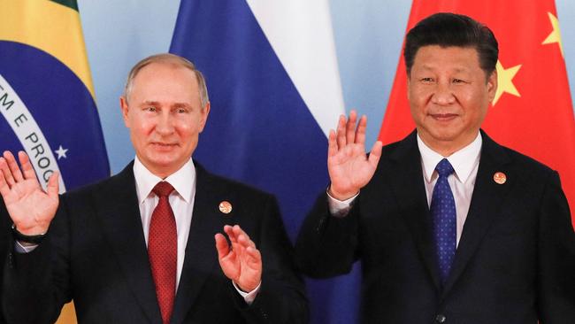 Vladimir Putin and Xi Jinping, the leaders of Russia and China, are pictured together in September 2017. Picture: AFP