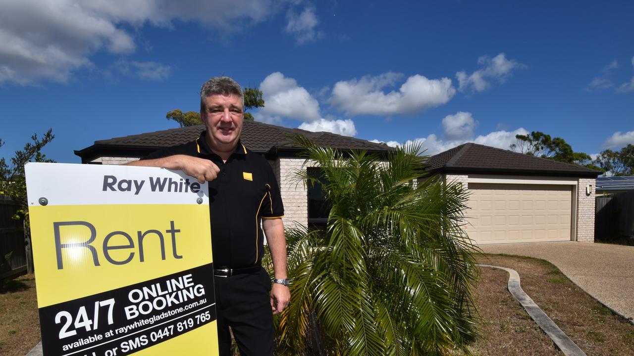 Ray White Gladstone director John Fieldus outside a rental property.