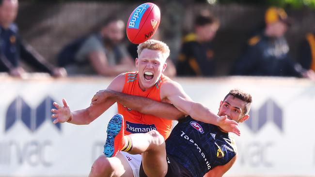 James Sicily impressed for the Hawks, taking on recruit Darren Minchington in this competitive image. Picture: Getty Images