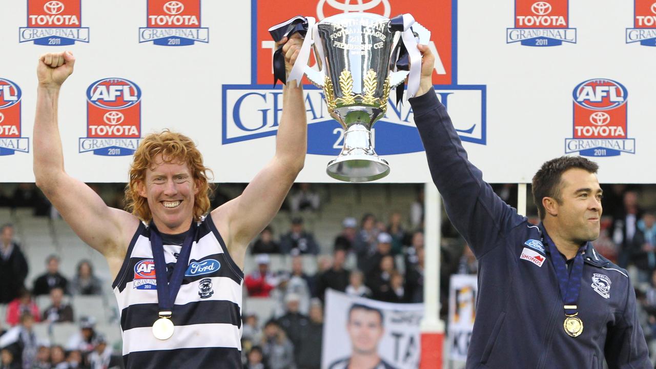 Cameron Ling and Chris Scott with the 2011 premiership cup.