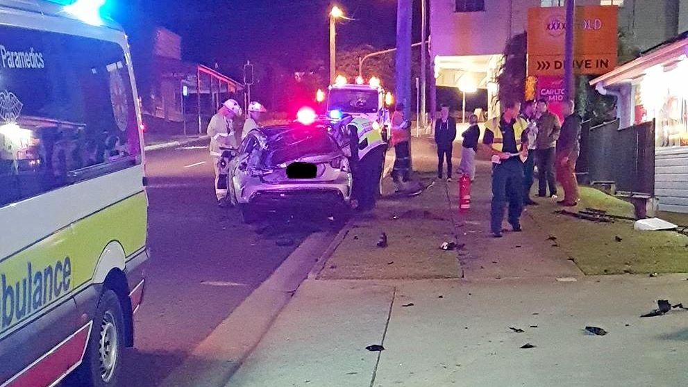 Chaotic car crash tears hole in Mount Pleasant Bottle-O | The Courier Mail