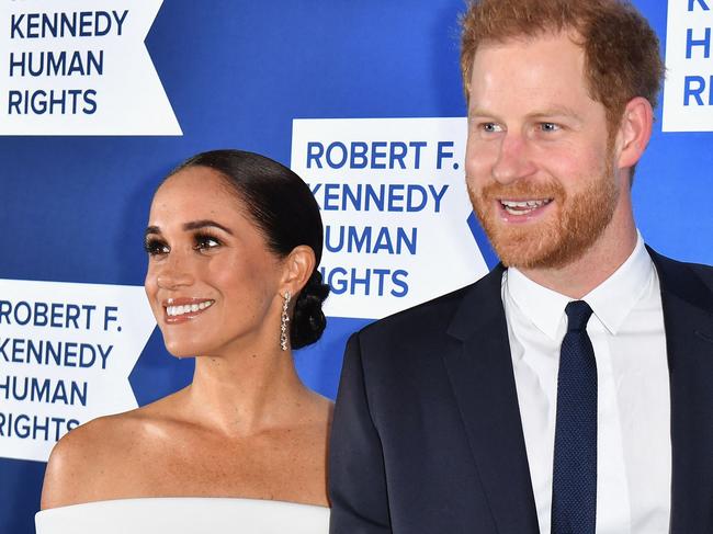 (FILES) Prince Harry, Duke of Sussex, and Meghan, Duchess of Sussex, arrive at the 2022 Robert F. Kennedy Human Rights Ripple of Hope Award Gala at the Hilton Midtown in New York City on December 6, 2022. Prince Harry and wife Meghan Markle were involved in a "near catastrophic car chase" involving paparazzi in New York late on May 16, 2023, a spokesperson for the couple said May 17. "This relentless pursuit, lasting over two hours, resulted in multiple near collisions involving other drivers on the road, pedestrians and two NYPD officers," the spokesperson added. (Photo by ANGELA WEISS / AFP)