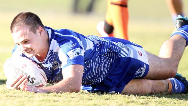 Tugun Seahawks (blue) vs. Southport Tigers at Tugun. A Grade. Zac Beecher scoring a try. 6 June 2021 Tugun Picture by Richard Gosling