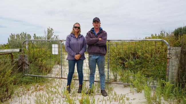 Wye landowners Jo and Morgan Feast have locked a gate to stop people accessing the beach from their private property. Picture: Jessica Ball