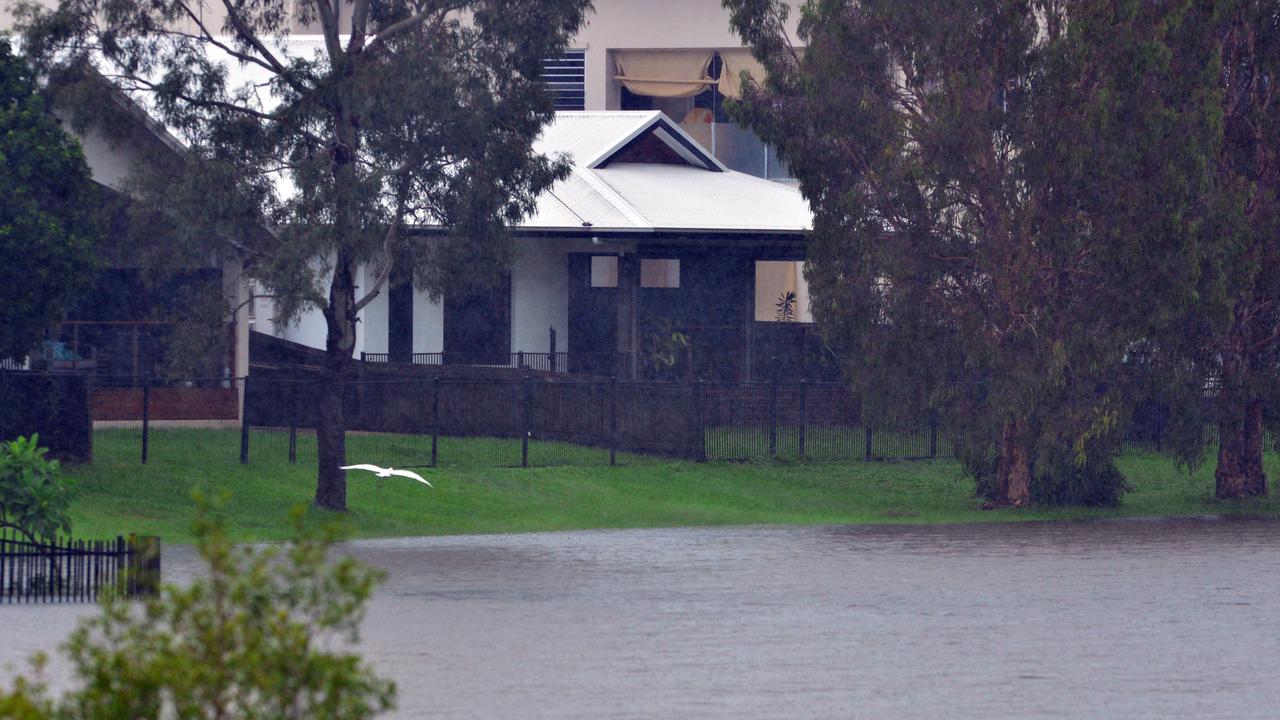 Locals get ready to evacuate from Idalia as water from the Ross River Dam is being released. Picture: Zak Simmonds