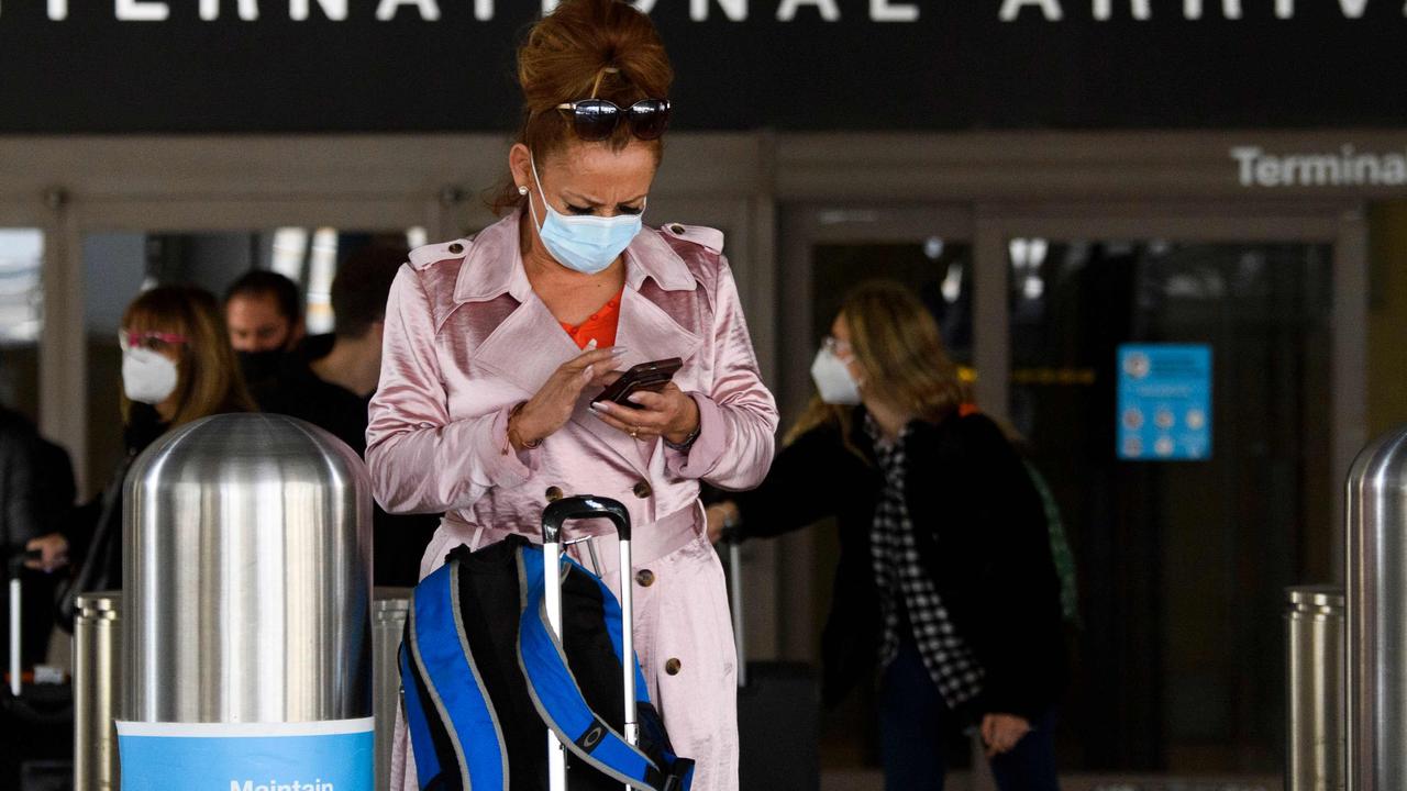 Masks will not be required with some US airlines domestically. Picture: Patrick T. FALLON / AFP.