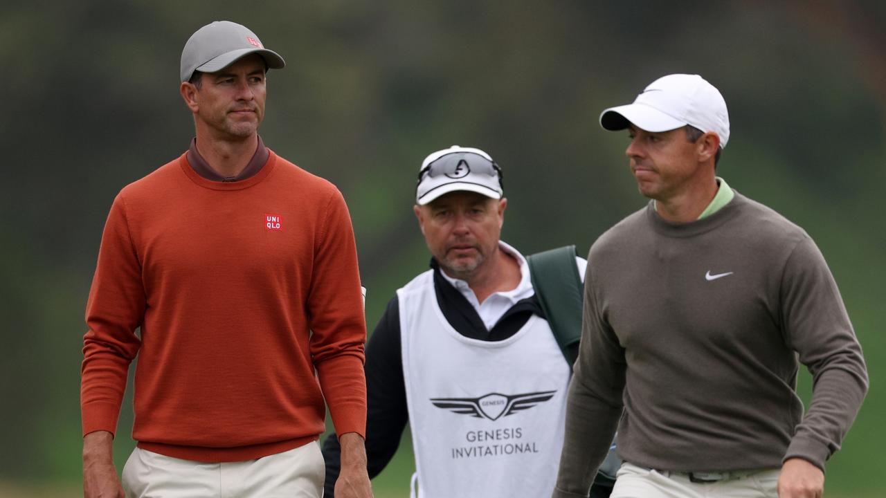 PACIFIC PALISADES, CALIFORNIA - FEBRUARY 17: Adam Scott of Australia and Rory McIlroy of Northern Ireland walk to the seventh green during the third round of The Genesis Invitational at Riviera Country Club on February 17, 2024 in Pacific Palisades, California. (Photo by Harry How/Getty Images)