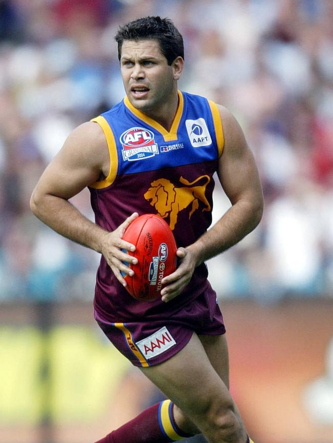 Chris Johnson in action for the Lions in the 2004 Grand Final.