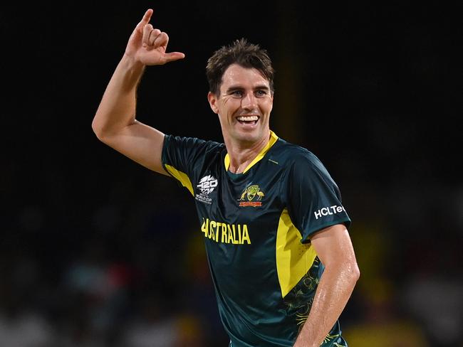 ST VINCENT, SAINT VINCENT AND THE GRENADINES - JUNE 22: Pat Cummins of Australia celebrates after dismissing Gulbadin Naib of Afghanistan (not pictured) for his hat trick during the ICC Men's T20 Cricket World Cup West Indies & USA 2024 Super Eight match between Afghanistan and Australia at Arnos Vale Ground on June 22, 2024 in St Vincent, Saint Vincent and The Grenadines. (Photo by Gareth Copley/Getty Images)