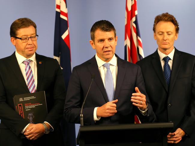 Premier Mike Baird (pictured Deputy Premier Troy Grant, left, and RSPCA chief executive Steven Coleman) has defended the ban. Picture: Stephen Cooper