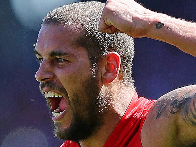 2014 AFL Grand Final match between Hawthorn Hawks and the Sydney Swans at the MCG Melbourne Cricket Ground on September 27, 2014. Sydney's Lance Franklin celebrates a goal. AFLGF2014. Picture: Tim Carrafa