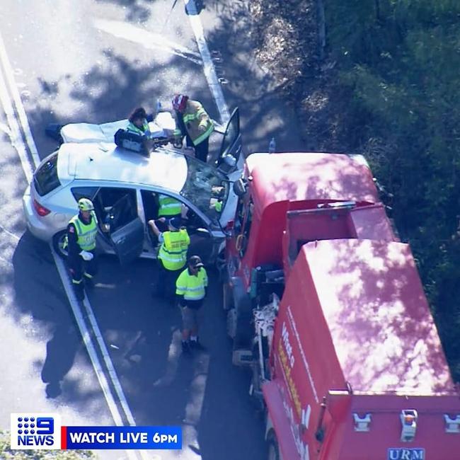 The collision between the garbage truck and the hatchback on Mona Vale Rd, Ingleside, on October 9. Picture: 9News