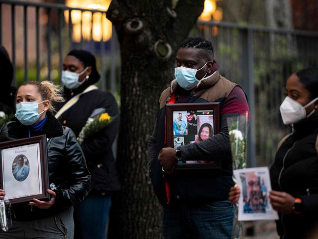 Nurses and healthcare workers mourn and remember their colleagues who died during the outbreak of the novel coronavirus during a demonstration outside Mount Sinai Hospital in Manhattan. Picture: AFP