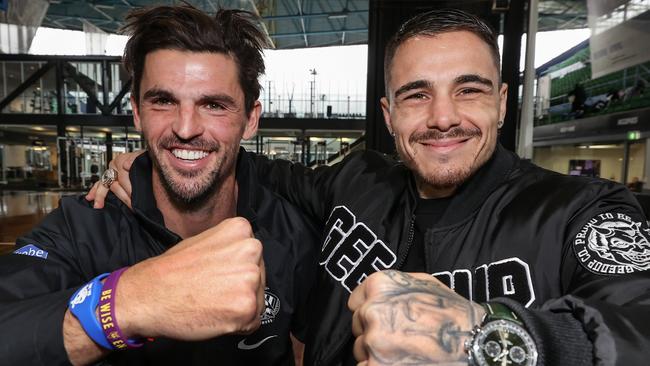 Australian boxer George Kambosos Jr meets Collingwood captain Scott Pendlebury during a visit to their headquarters. Picture: David Caird