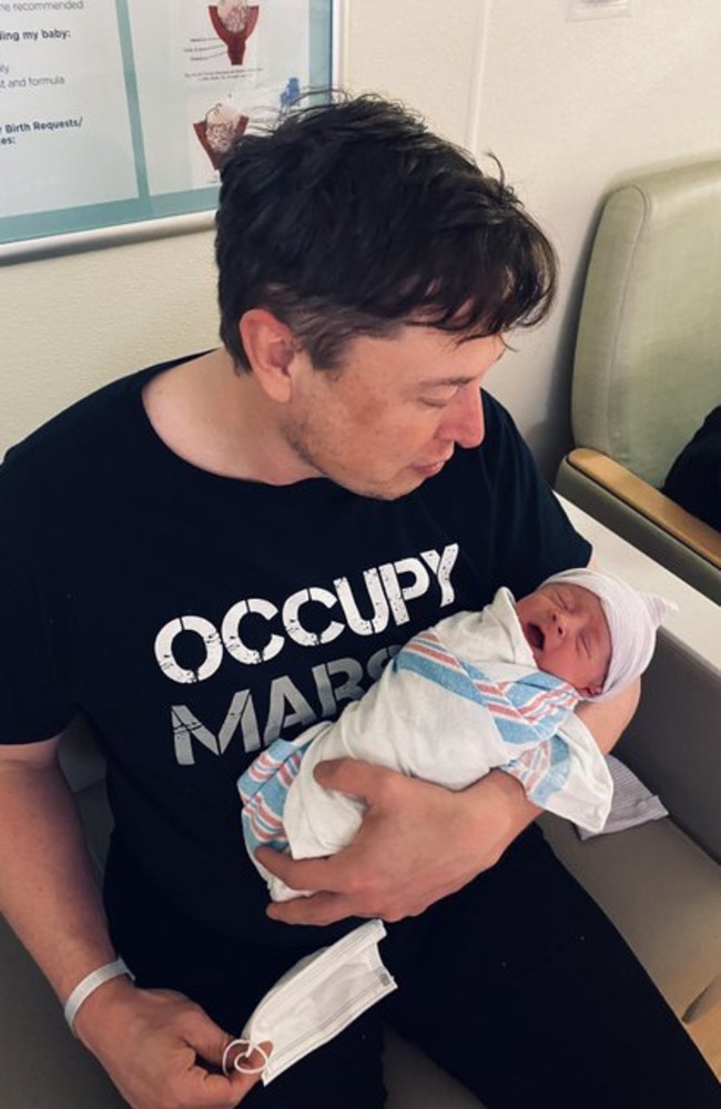 Elon Musk with one of his two children with Grimes. Picture: Twitter