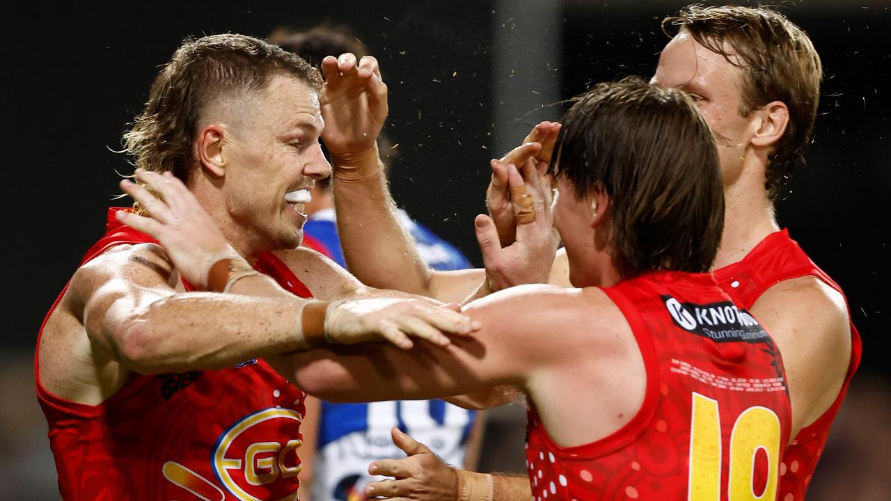 Nick Holman (left) and Bailey Humphrey of the Suns celebrate during the 2023 AFL Round 11 match between the Gold Coast Suns and the Western Bulldogs at TIO Stadium. (Photo by Michael Willson/AFL Photos via Getty Images)