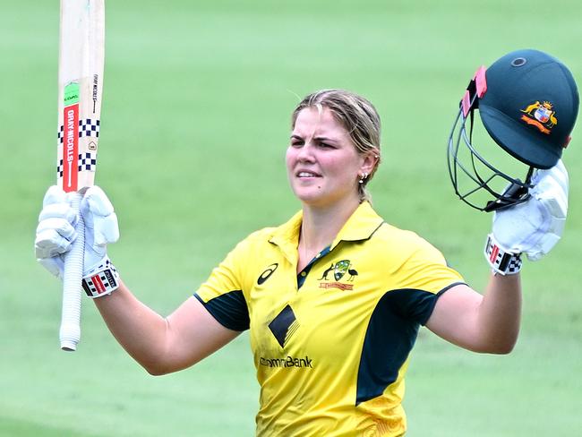 BRISBANE, AUSTRALIA - DECEMBER 08: Georgia Voll of Australia celebrates after scoring a century during game two of the Women's One Day International Series between Australia and India at Allan Border Field on December 08, 2024 in Brisbane, Australia. (Photo by Bradley Kanaris/Getty Images)