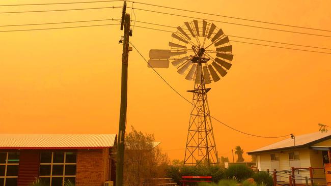 A dust storm turns the sky yellow in rural Australia.