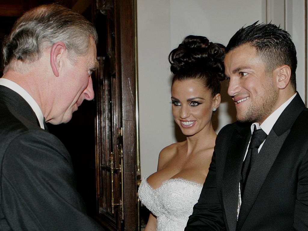 Katie Price and then husband Peter Andre meeting Prince Charles in 2006.