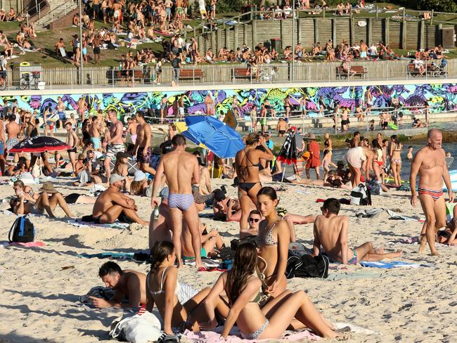 Crowds at Sydney’s Bondi Beach on Friday, March 20. Images such as these caused a huge public debate. Picture: AAP Image/John Fotiadis