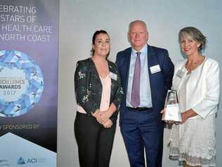 BIG WIN: Rachel Heath and Helen Bolt from Heritage Lodge with Northern NSW Local Health District CEO Wayne Jones. Picture: contributed