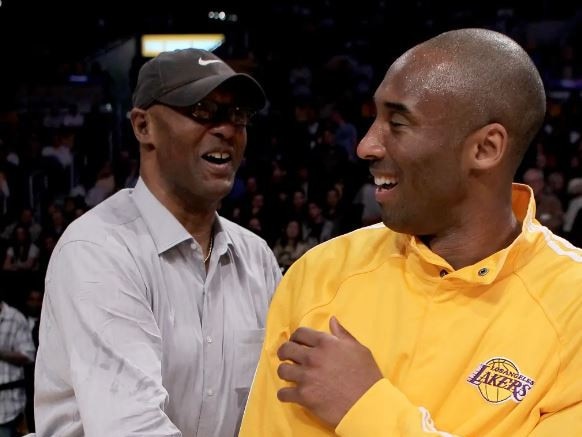 Kobe Bryant (right) laughs with father Joe Jelly Bean Bryant (left). Getty Images