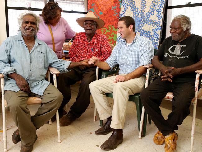 Kyam Maher along with his translator Ebony Benson-De Rose, flanked by artists Rupert Jack, Gordon Ingkatji and Pepai Carroll at the Ernabella Arts Centre in the APY Lands in 2015. Picture: Calum Robertson