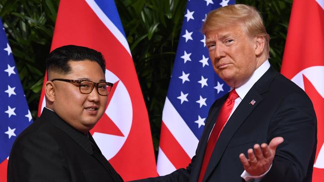 North Korea's leader Kim Jong-un with US President Donald Trump in Singapore in June 2018. Picture: AFP