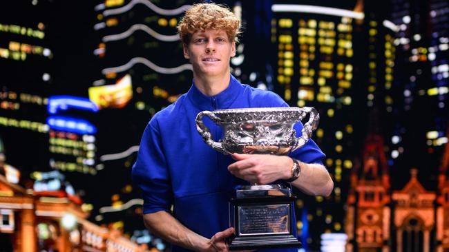 Jannik Sinner poses with the Norman Brookes Challenge Cup trophy after beating Germany's Alexander Zverev to win the 2025 Australian Open men’s singles final in January. Picture: Tennis Australia/AFP