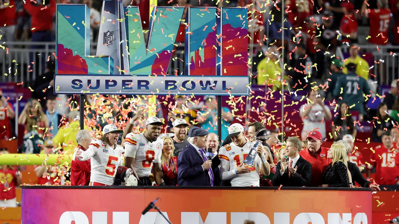 GLENDALE, ARIZONA - FEBRUARY 12: Patrick Mahomes #15 of the Kansas City Chiefs celebrates with the the Vince Lombardi Trophy after defeating the Philadelphia Eagles 38-35 in Super Bowl LVII at State Farm Stadium on February 12, 2023 in Glendale, Arizona. (Photo by Carmen Mandato/Getty Images)