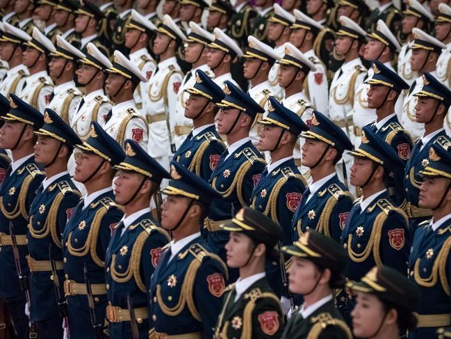 Chinese People's Liberation Army honour guard wait for the welcome ceremony for Sierra Leone President Julius Maada Bio at the Great Hall of the People in Beijing on August 30, 2018. - Julius Maada Bio is in China for the Forum on China-Africa Cooperation which will be held from September 3-4 in Beijing. (Photo by Roman PILIPEY / POOL / AFP)