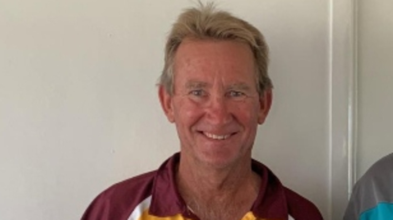 Bundaberg Cricket Association president Ian Grills is presented with the award for Queensland Cricket association of the year award, which Bundaberg won for last season. He was presented with the award by Queensland Cricket's Chris Walker.