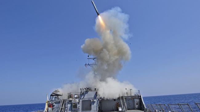 A US Navy guided-missile destroyer launches a Tomahawk cruise missile. Picture: US Navy/AFP