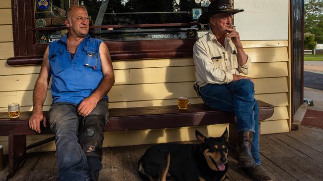 Publican Steven Hall, Bullbar and Rum relax at the front of the Dargo Hotel. Picture: Jason Edwards