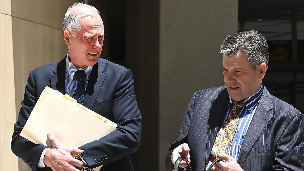 Gold Coast lawyer Beau Hartnett (left), with his barrister Richard Cowen, leaves the Federal Court where he attending a hearing into his personal insolvency. Picture: NewsWire / John Gass